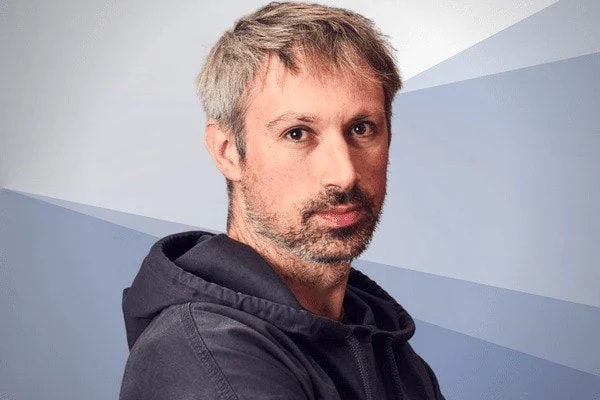 Image of Gavin Wood - Founder of Polkadot wearing grey hoodie