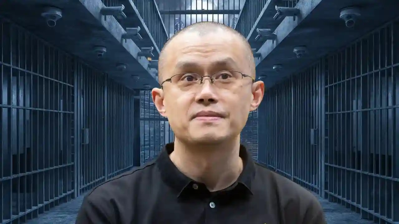 Binance founder, CZ Binance in prison, wearing a black tshirt and goggles